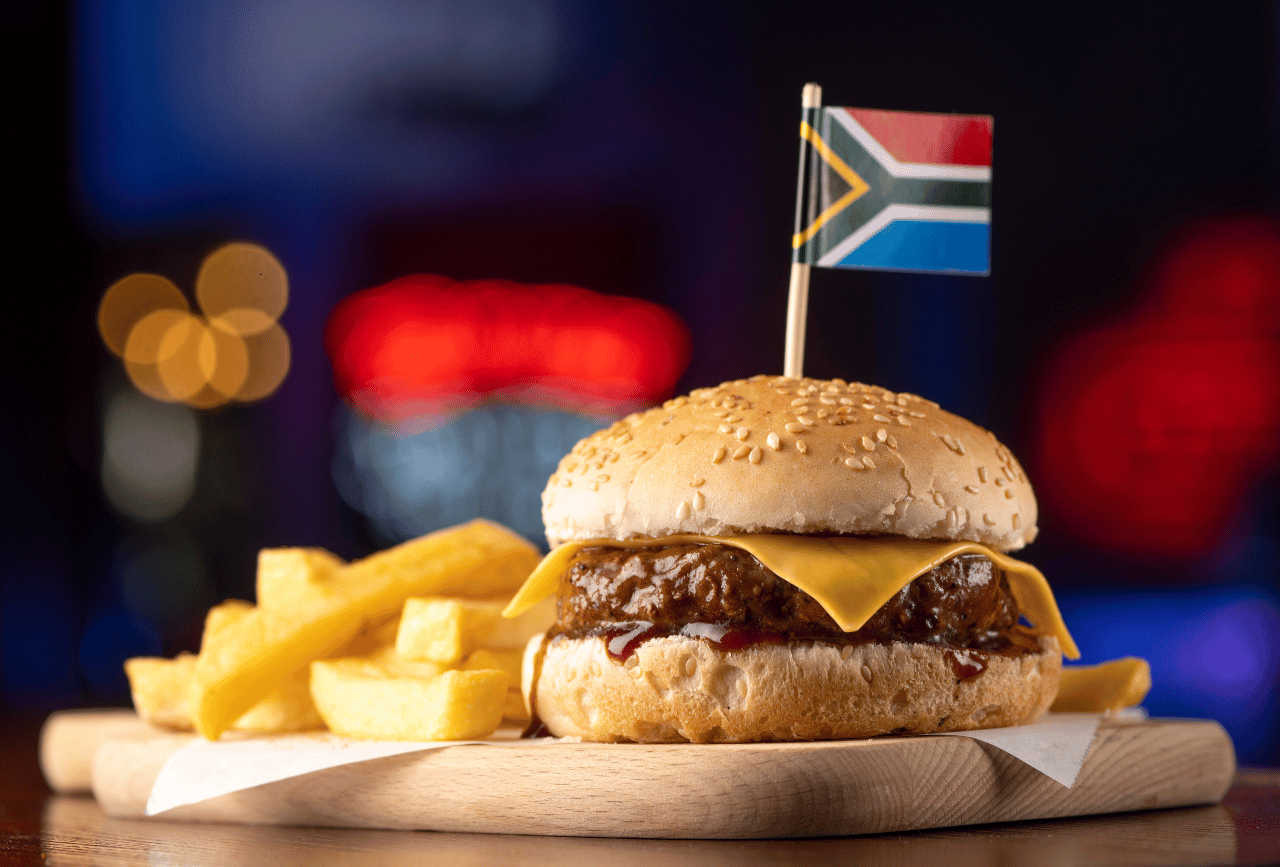 Image of the Dros Kidz burger with chips sporting a South African flag